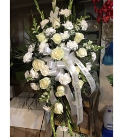 Truly White Easel Spray. An arrangement by Renton Flower Shop.