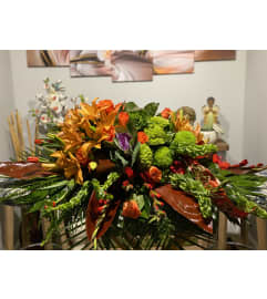 Casket #12. An arrangement by Seasons Change Designs.
