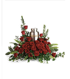 Red Rose Cremation Urn. An arrangement by Seasons Change Designs.