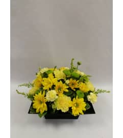 Ray of Sunshine Arrangement. An arrangement by Balloon Bouquets Plus.