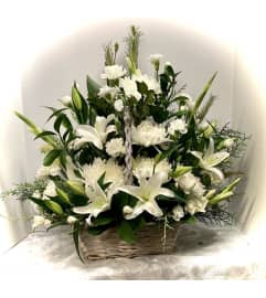 Basket of Lilies. An arrangement by Awesome Blossom.