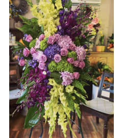 God's Garden Standing Spray. An arrangement by Seasons Change Designs.