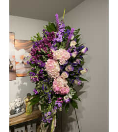 Heavenly Dawn Light Standing Spray. An arrangement by Seasons Change Designs.