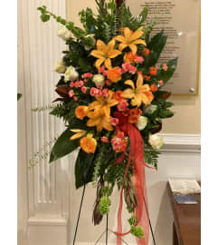 Love Is Golden Standing Spray. An arrangement by Seasons Change Designs.
