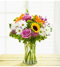 Cheerful Blooms vibrant Bouquet. An arrangement by Elegant Florist.