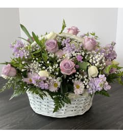 Calm Love Basket. An arrangement by Violeta's Flower Shop.