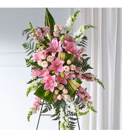 Elegant Embrace Standing. An arrangement by Elegant Florist.