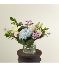 22-M3 Beach House. An arrangement by Blossoms On The Trail.