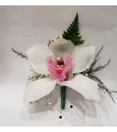 White Cimd Orchid Boutonniere 2024. An arrangement by Northwest Florist.