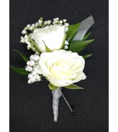 White Mini Rose Boutonniere 2023. An arrangement by Northwest Florist.