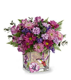 Lovely Hummingbird. An arrangement by Awesome Blossom.