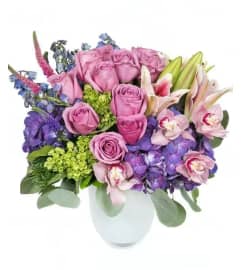 Purple Butterfly. An arrangement by Win's Flowers.