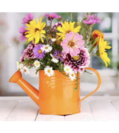 Mother's Day Watering Can 2. An arrangement by Kelly Ann's Floral.