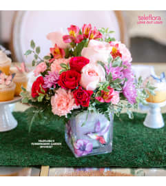 Hummingbird Kisses. An arrangement by Erie Gardens.