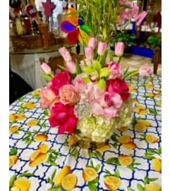 Moms Treasure. An arrangement by Manny's Flower Design.