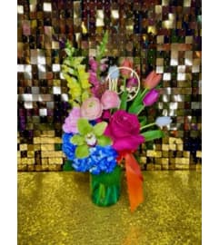 Laura Mason. An arrangement by Manny's Flower Design.
