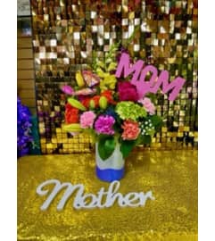 Moms Vase. An arrangement by Manny's Flower Design.