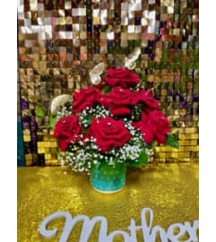Moms Rose. An arrangement by Manny's Flower Design.