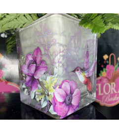 Humming Bird prayer. An arrangement by The Floral Basket. Humming Bird prayer. An arrangement by The Floral Basket.