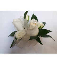 Ivory Roses with Spray Rpses. An arrangement by Jennifer's Flowers and Gifts.