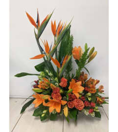 Liles With Birds. An arrangement by Jennifer's Flowers and Gifts.