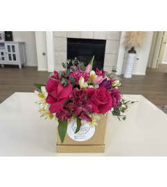 Small floral box. An arrangement by Eternity Flowers US.