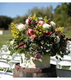 Wine Barrel arrangement. An arrangement by Weaver the Florist and Gifts.