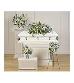 TELEFLORA'S TENDER REMEMBRANCE COLLECTION-R. An arrangement by Tim's Florist and Garden.
