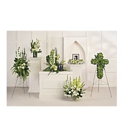 TELEFLORA'S TRANQUIL PEACE COLLECTION-C. An arrangement by Triple A Florist.