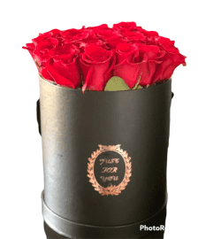 Love Red Roses. An arrangement by Charming Blooms.