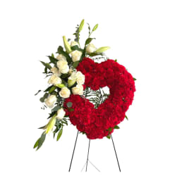Sympathy Red Heart. An arrangement by Charming Blooms.