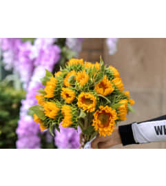 Bouquet of GoldenSunflowers. An arrangement by Grower's Flower Market and Gifts.