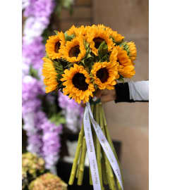 Bouquet of ClassicSunflowers. An arrangement by Grower's Flower Market and Gifts.