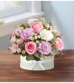 Elegant Sentimental Surprise™ Bouquet. An arrangement by Elegant Florist.