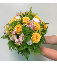 Bright Rays of Sun. An arrangement by Mrs. Bee's Floral.