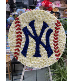 NEW YORK YANKEE BALL. An arrangement by Elegant Florist.