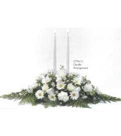 White Candle Arrangement CTT4-11. An arrangement by Roma Flowers and Gifts.