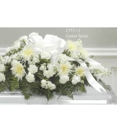 Casket Spray CTT7-11. An arrangement by Roma Flowers and Gifts.