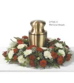 Red and White Urn Wreath(Ctt25-11). An arrangement by Roma Flowers and Gifts.