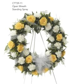 Yellow Rose White Carnation Wreath(Ctt39-11). An arrangement by Roma Flowers and Gifts.