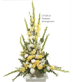 Yellow With White Pedestal Arrangement(Ctt39-21). An arrangement by Roma Flowers and Gifts.