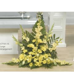 Yellow Floor Arrangement(Ctt41-14). An arrangement by Roma Flowers and Gifts.