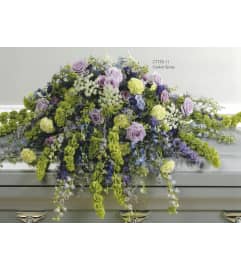 Purple and Green Casket Spray(Ctt55-11). An arrangement by Roma Flowers and Gifts.