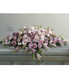 Pink Lavender and Mauve Full Length Casket Spray(Ctt62-11). An arrangement by Roma Flowers and Gifts.