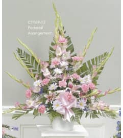 Pink Pedestal Arrangement(Ctt69-12). An arrangement by Roma Flowers and Gifts.