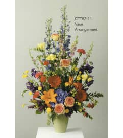 Bright Mix Arrangement(Ctt82-11). An arrangement by Roma Flowers and Gifts.