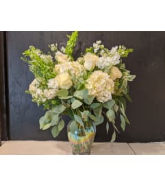 With Deepest Sympathies. An arrangement by Fleur du Jour.