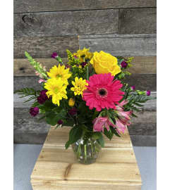 Sunrise Blooms. An arrangement by The Farm and Floral Market.
