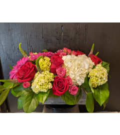 Rosey Reds. An arrangement by Fleur du Jour.
