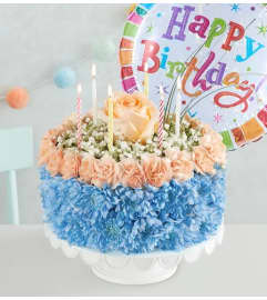 Coastal Wishes Flower Cake. An arrangement by L and J Blooms.